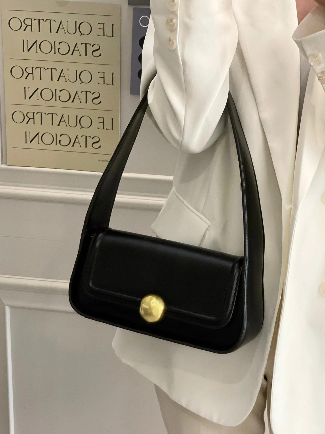 

Портативная сумка-багет подмышечная женская 2024 новая сумка черная высококачественная нишевая текстура модная сумка через плечо чёрный