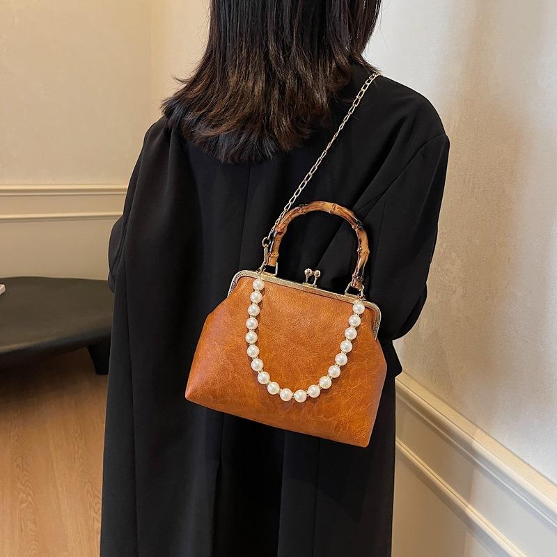 Spring and summer retro small bag women's new fashion bamboo joint portable mouth gold bag pearl chain messenger bag