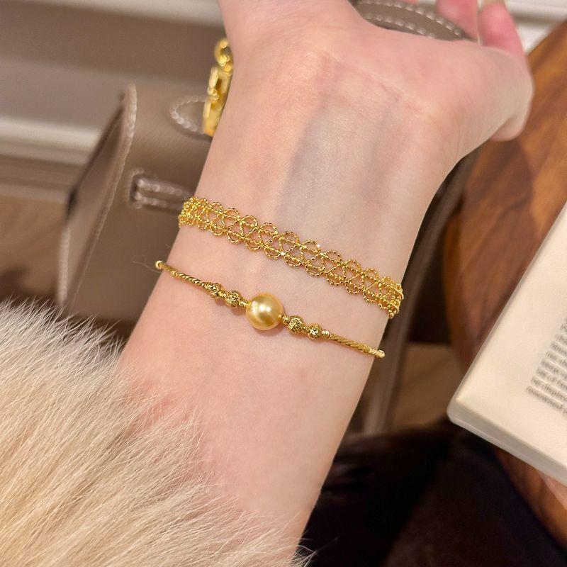 Stacked high-end ribbon gold lace bracelet women's light luxury ins niche high-end retro pearl bracelet bracelet bracelet