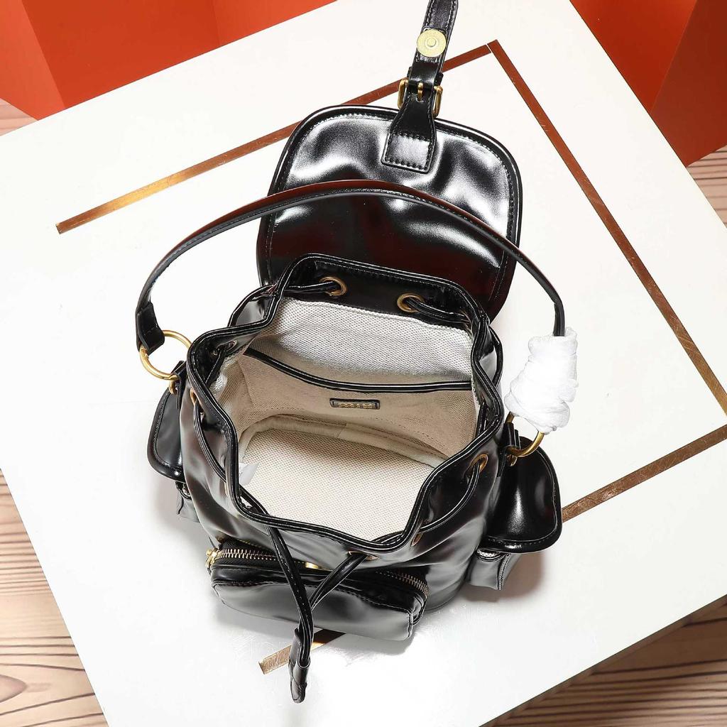 Nový Miao miu 2025 plátěný batoh velkokapacitní prémiový pocit všestranný přenosný ramenní cestovní dojížděcí batoh