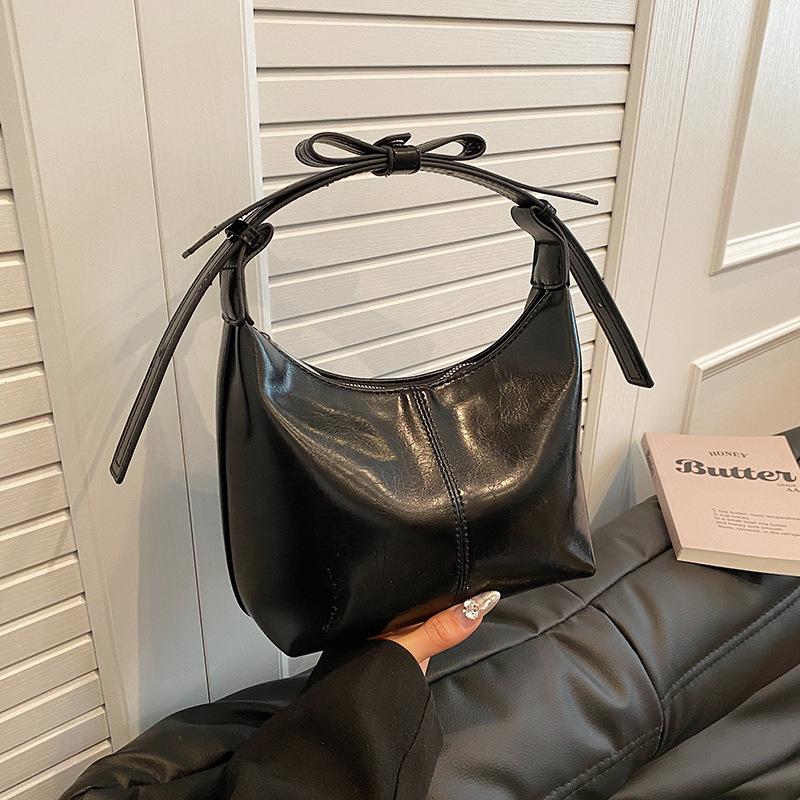 

Премиальная текстура нишевая сумка женская новая летняя универсальная на плечо кроссбоди сумка под мышку сумка-пельмень чёрный