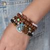 Bohemian Retro Flower Tassel Beaded Bracelet Set - 5-Piece Elastic Cord with Wood Beads