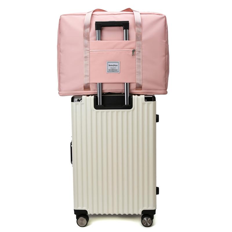 Luggage bags, new large-capacity expansion short-distance travel bags, portable maternity and maternity storage bags.