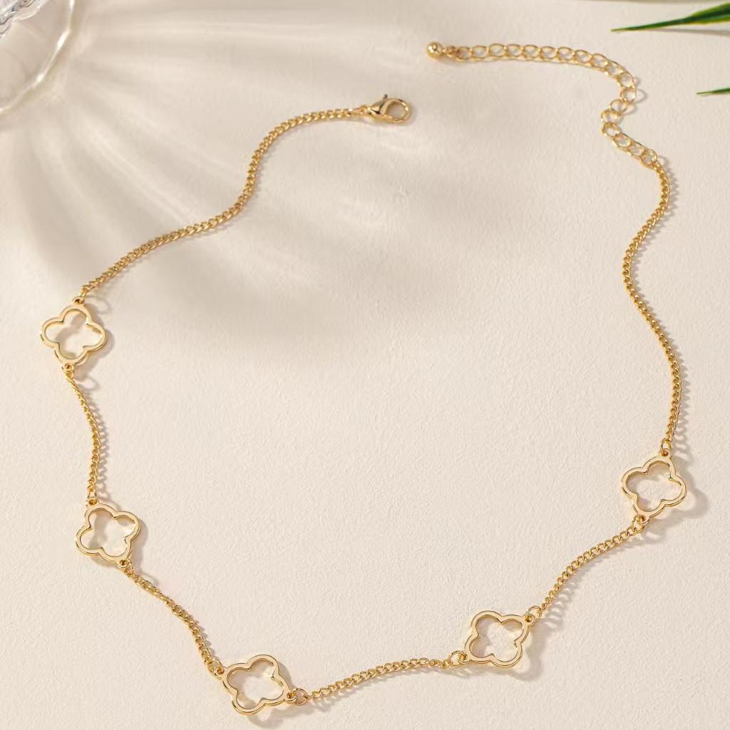 Elegant Hollow Four-Leaf Clover Flower Necklace - Women's High-End Clavicle Chain