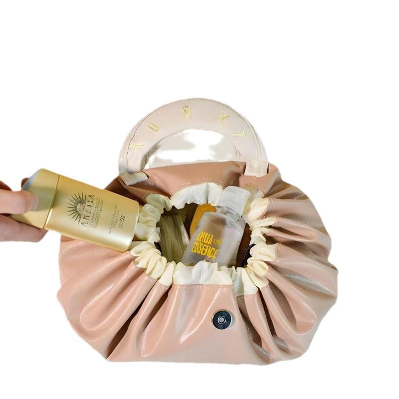 Trousse de maquillage portable à cordon de serrage de grande capacité