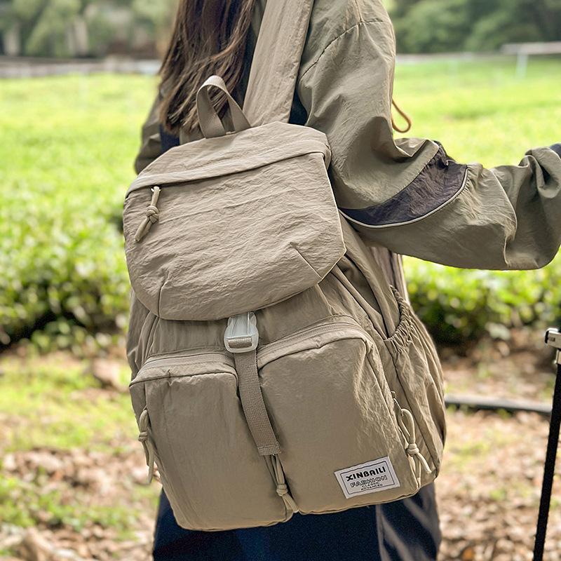Outdoor japanische Farbkombination Rucksack große Kapazität Mehrfachtaschen Schultasche einfacher lässiger Rucksack Spritzwassergeschützt und verschleißfest