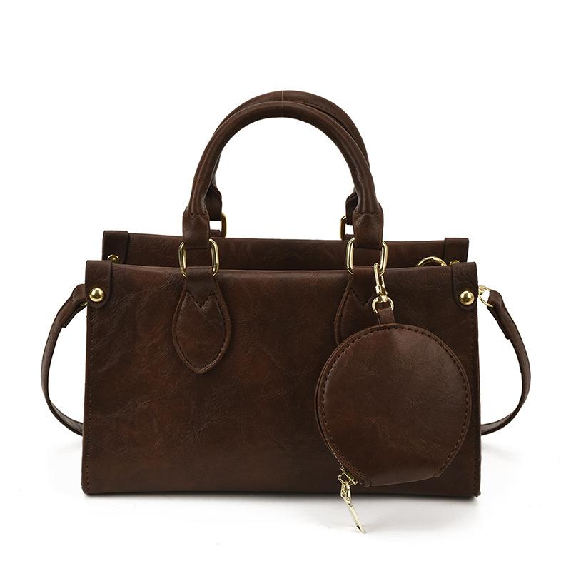 High-end handheld small square bag women's 2025 new retro fashion shoulder bag niche design commuter crossbody bag for women