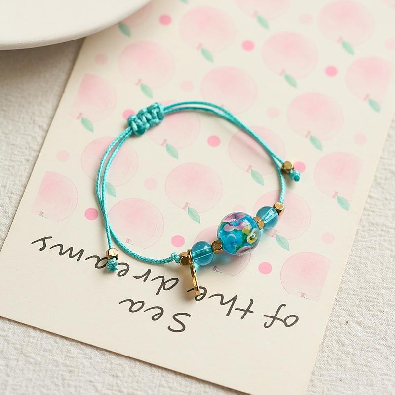 Luminous glazed flower red rope bracelet weaving simple and versatile men's jewelry gift bracelet origin