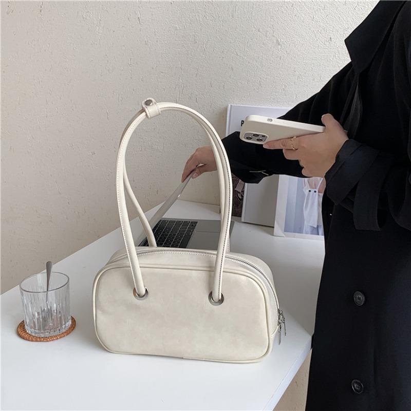 Simple shoulder bag Large capacity versatile handbag Women's niche design Underarm bag Hand carry