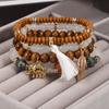 Bohemian Elephant Leaf Tassel Pendant Bracelet with Wooden Beads