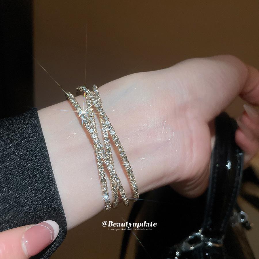 Elegant Diamond-Studded Geometric Multi-Layer Open Bangle - Luxurious French High-End Jewelry.