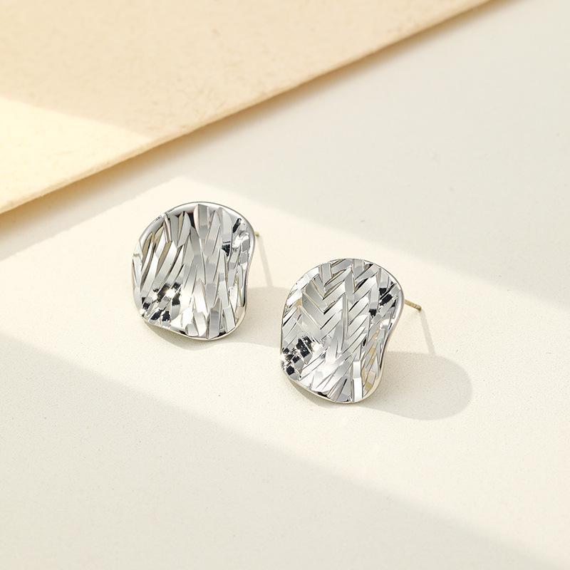 Irregular Crushed Ice Metal Stud Earrings: Luxurious French Design for Women.
