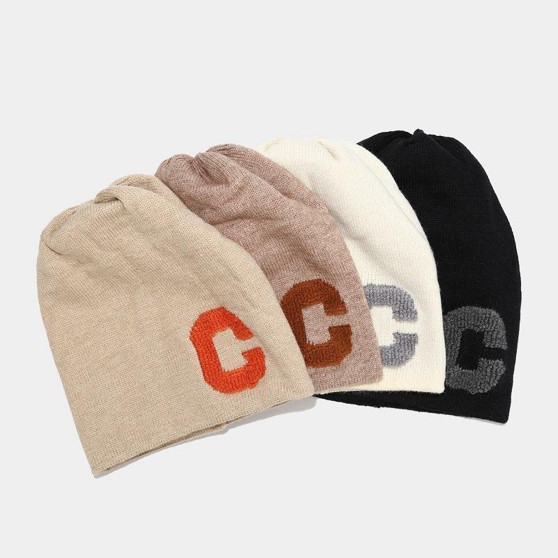 Autumn and winter big head circumference C letter loose knitted stacking hat women's trend ear protection headgear men's blue cold hat