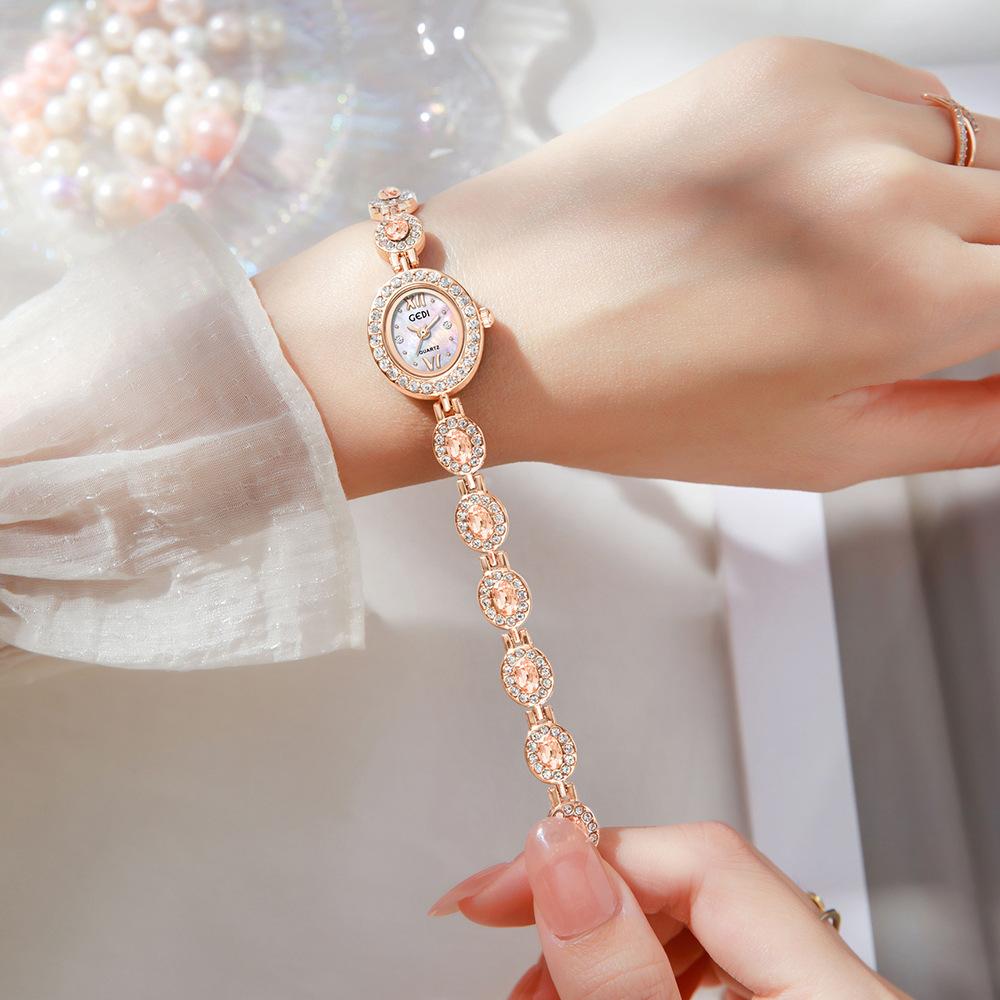 Reloj de Pulsera de Gama Alta de Nicho Reloj de Cuarzo Ovalado de Pedrería de Lujo Ligero Reloj Pequeño Exquisito Literario para Mujer