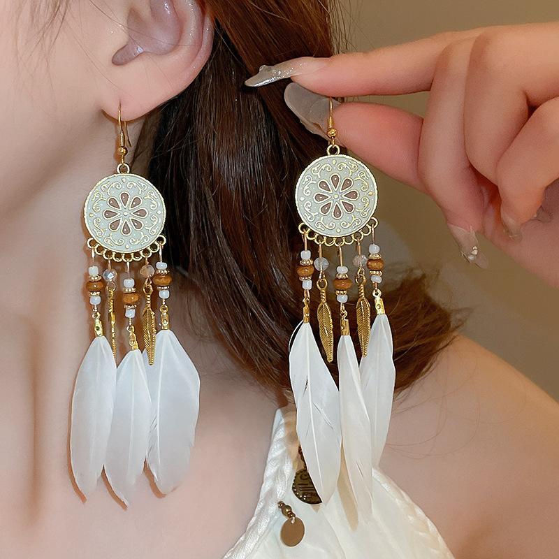 Bohemian ethnic style fringed earrings long niche woven feather earrings new travel wear earrings women
