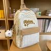 New high-value, fresh and sweet candy-colored striped backpack, high school student large-capacity backpack.