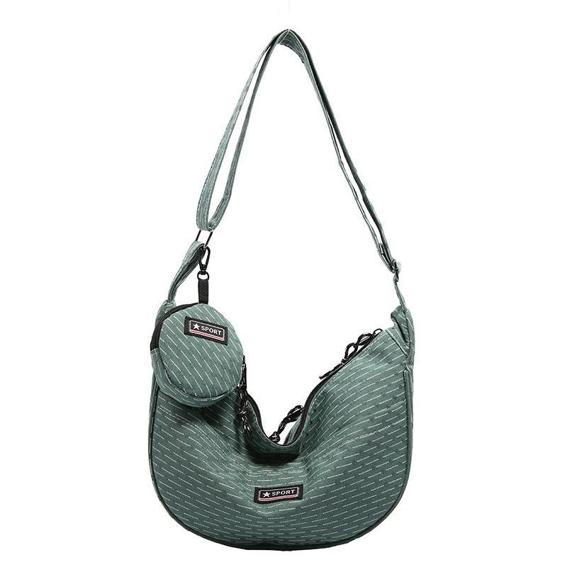 

Female Japanese dumpling bag ins versatile canvas messenger bag casual large capacity class commuter casual shoulder bag зелений