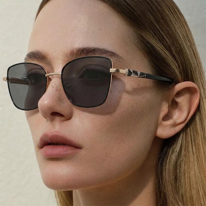 Cat-eye photochromic sunglasses—sun-protective shades for outdoor vacations.
