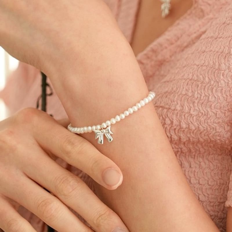BELLOOGGI Heart Ribbon Pearl Bracelet