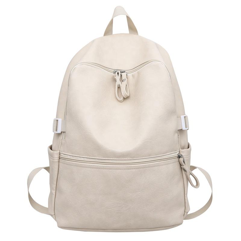 

Retro PU schoolbag female college student high school junior high school student simple large capacity computer backpack male commuter backpack tide білий