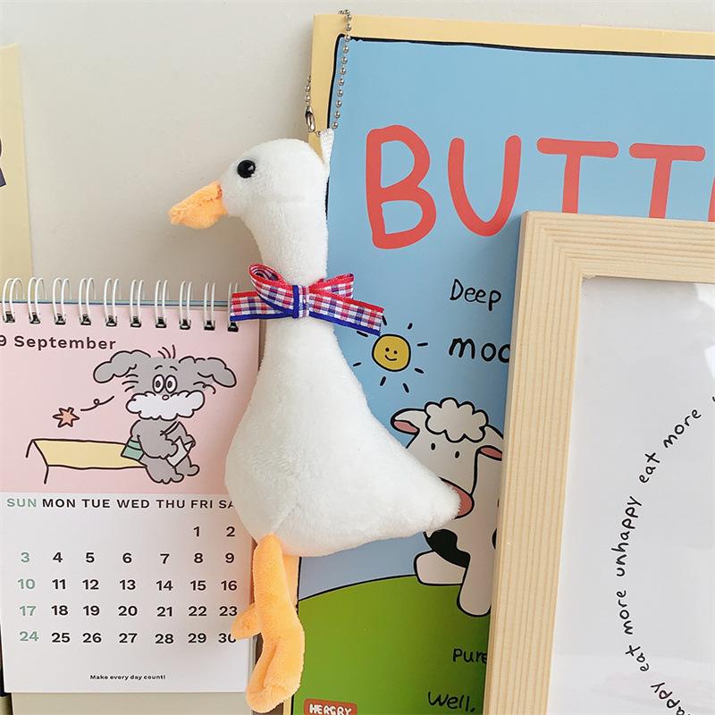 

New Duck Plush Doll Pendant Mini Grabbing Machine Doll height about 12cm
