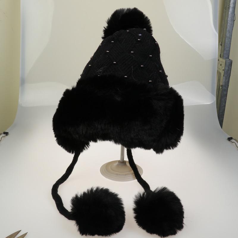 Winter Women's Knitted Hat with Beads and Fur Pom, Featuring a Velvet Lining, Large Fur Brim, and Warm Ear Protection.