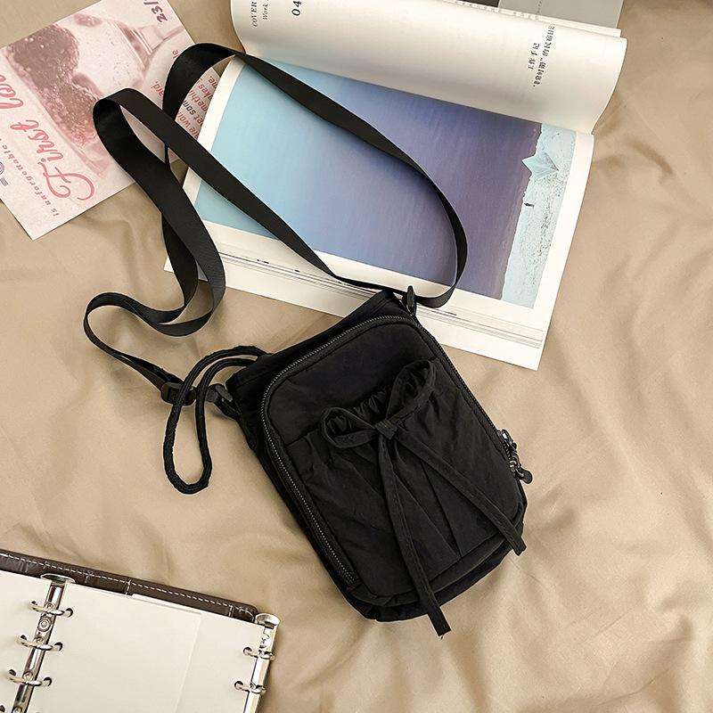 

2025 new lightweight bow bundle messenger bag large capacity mobile phone bag umbrella kettle bag women s shoulder bag 16*6*22 чорний