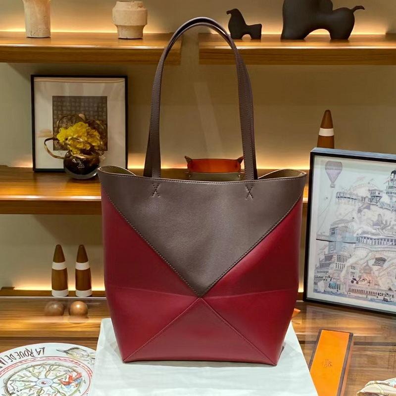 2026 New Genuine Leather Women's Bag Deformation Geometric Splicing Folding Tote Single Shoulder Diagonal Cross Trendy Manufacturer