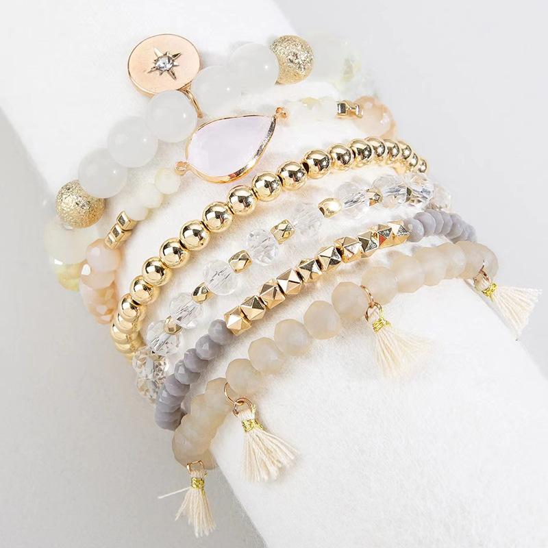 Korean version of fashion stretch line multi-layer bead women's bracelet set retro bohemian fringed pendant hand jewelry women