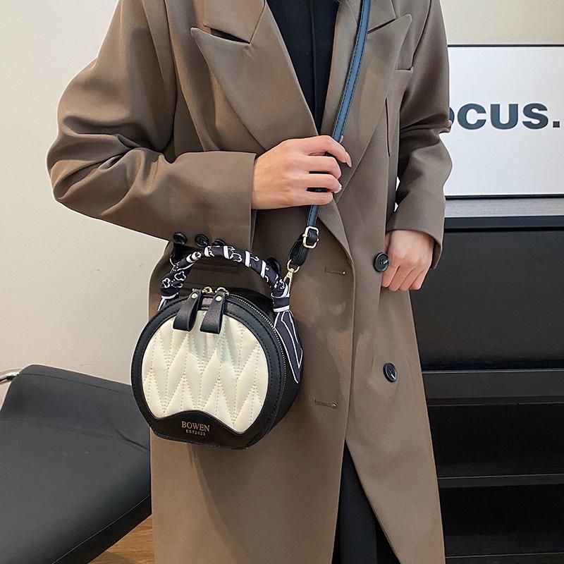 Französische Nischen-High-End-Handtasche für Damen, neue Herbst-/Wintermode, vielseitige kleine runde Tasche, beliebte Umhängetasche