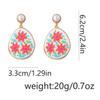 Simple, fashionable, fresh and sweet alloy printed flower imitation pearl earrings, niche daily commuting earrings for women
