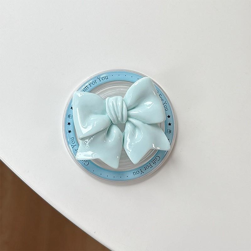 

Solid Color Bow Magnetic Suction Phone Airbag Holder Korean Instagram Style Desktop Retractable Stand Creative Watching TV Shows