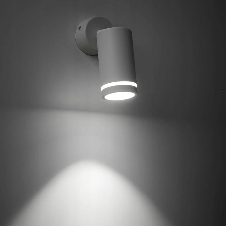White GU10 ceiling lamp. Single surface-mounted spotlight with movable spotlight.