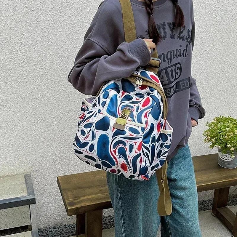 New Oxford Fabric Large Capacity Women's Schoolbag Trendy Printing Casual Travel Bags 2026 Hot Sale Fashion Versatile Backpack