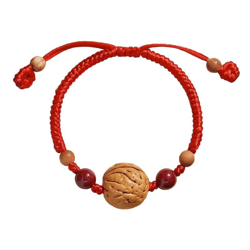 Wild Peach Wood Baby Amulet Bracelet: Soothing Red String with Peach Pit for Benmingnian & Pregnant Women.