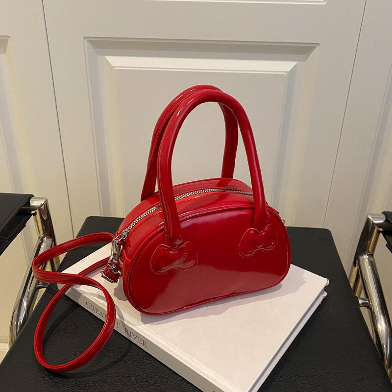 Korean portable red sweet bag women's 2025 new trendy fashion exquisite versatile ins messenger bowling bag