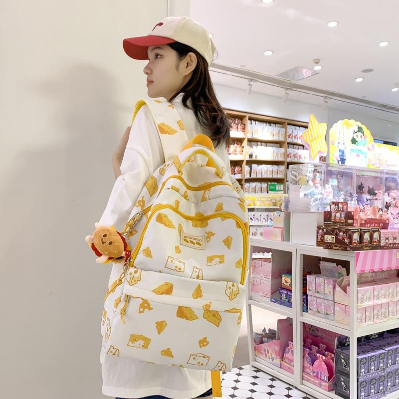 

Graffiti print bear student schoolbag junior high school student ins wind large capacity backpack with pendant