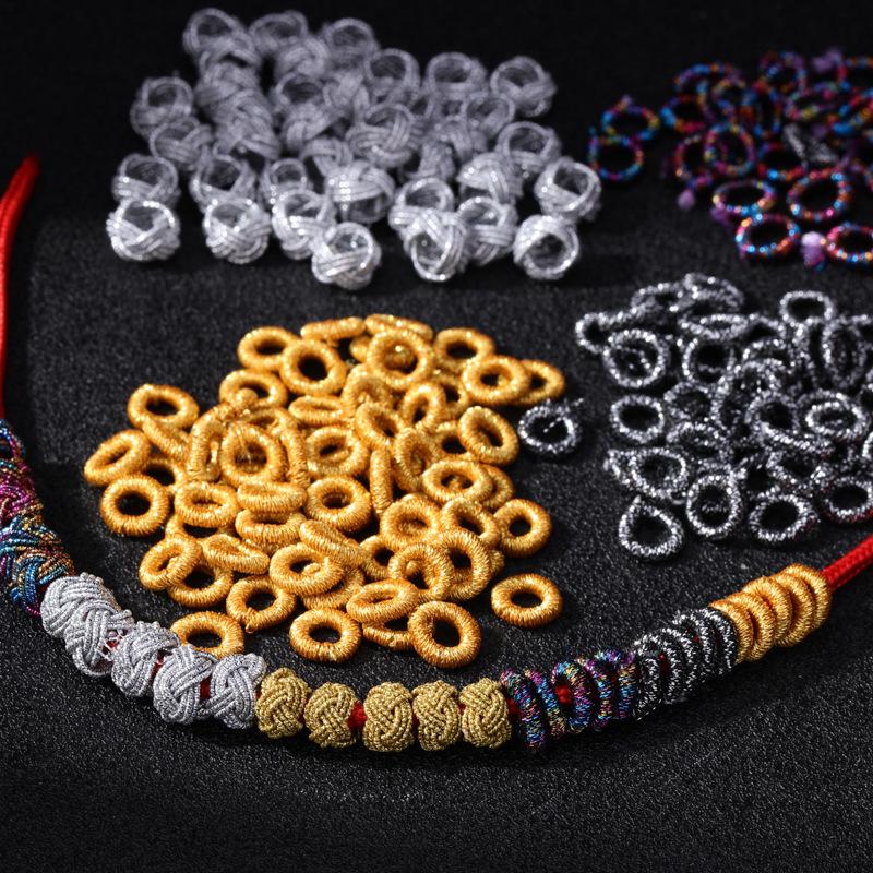 Exquisite Gold Ring with Wire Coil, Gold & Silver Buckle, and Woven Knot Ball