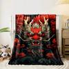 Fiery dragon head with horns, surrounded by red scales and swirling clouds. for all seasons blanket lunch break throw gift