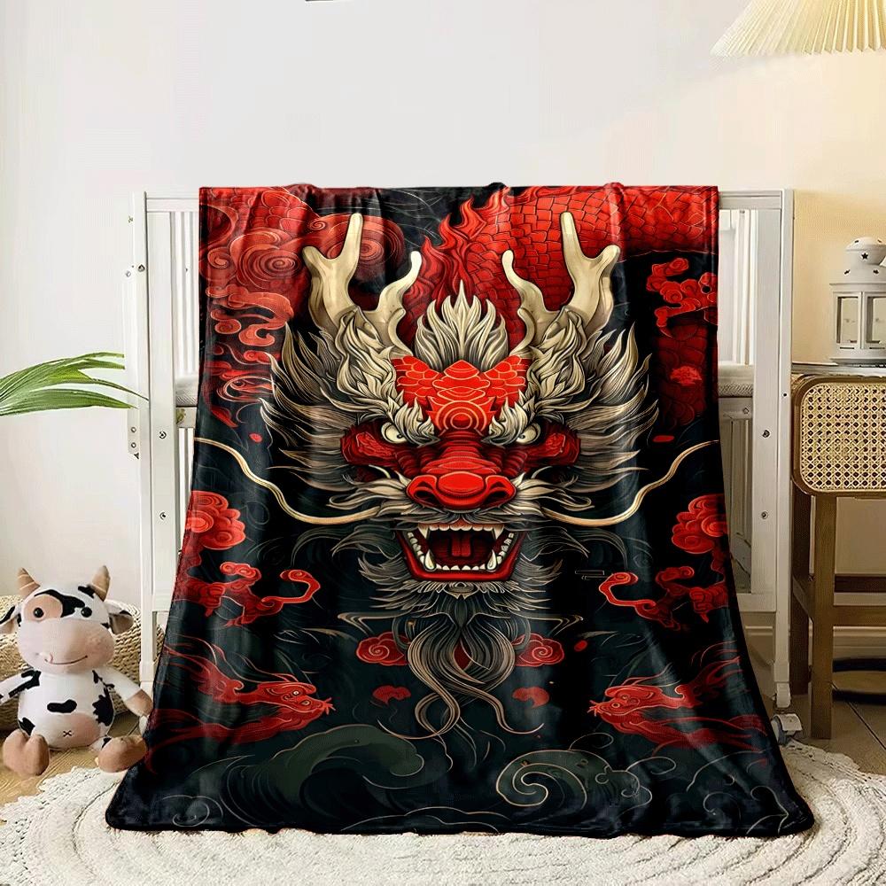 Fiery dragon head with horns, surrounded by red scales and swirling clouds. for all seasons blanket lunch break throw gift