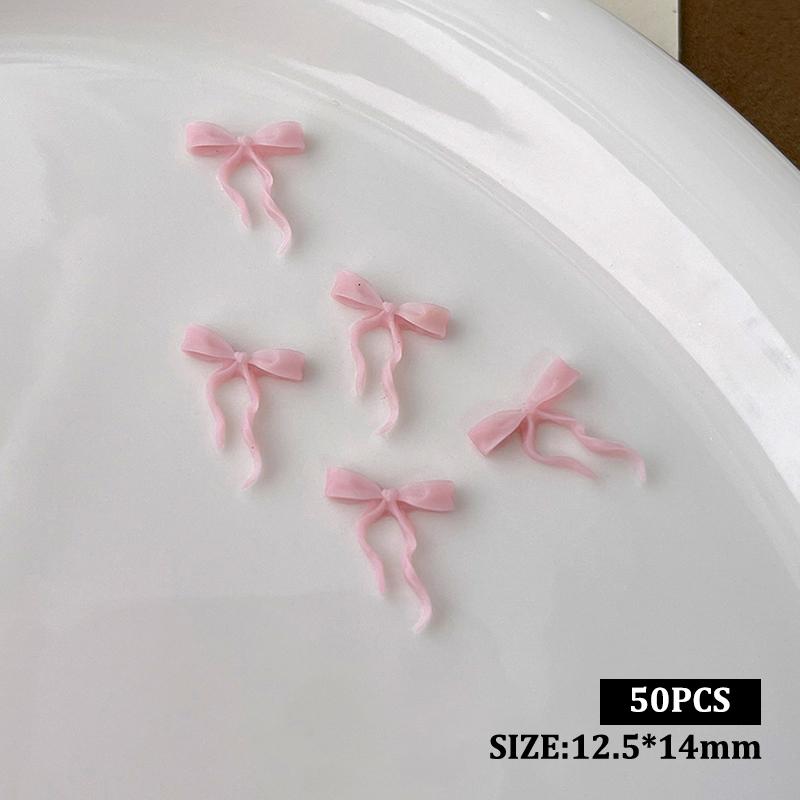 

50 шт. Хвилясті стрічкові бантики Прикраси для нігтів Одноколірні бантики Смоляні прикраси для нігтів для DIY шпильок для волосся, нігтів, деталі світло-рожевий колір