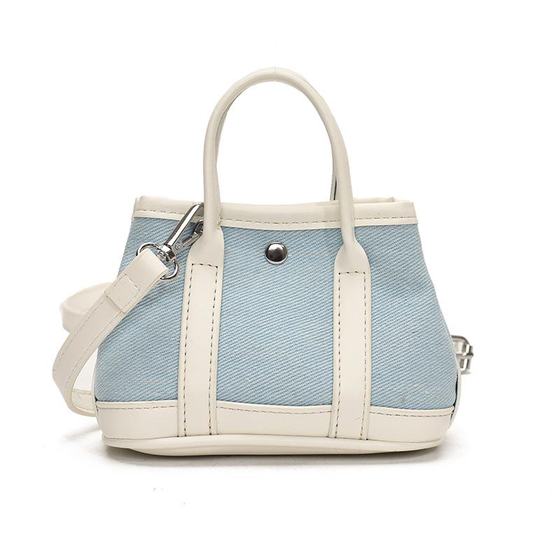 

New product wholesale niche design simple mini handbag Korean personality versatile lychee pattern messenger change bag woman