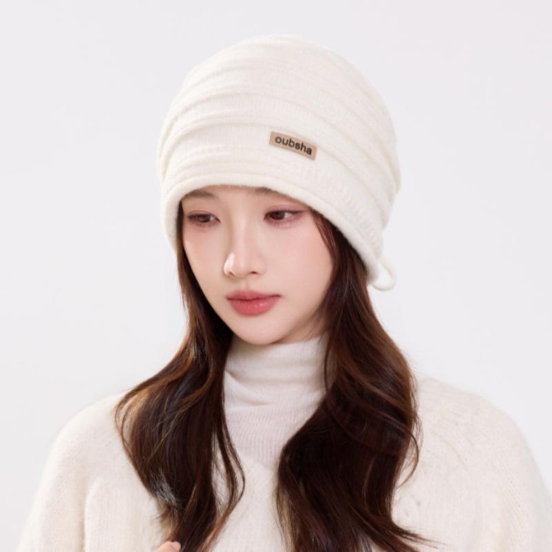 Winter new versatile solid color cloth label strap stacking hat women's thickened warm knitted hat source