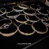 Bracciale Geometrico in Zirconi di Lusso: Elegante Design Intagliato per Donna
