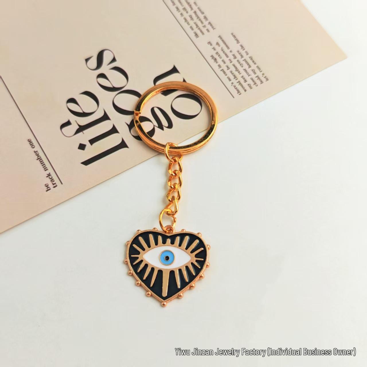 

Demon Eye Alloy Keychain Pendant – Enamel AirPods Accessory Bag Charm