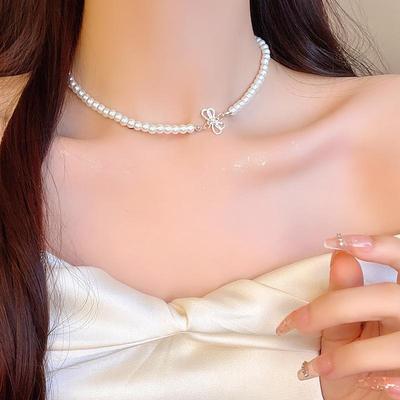 Colar de clavícula de pérolas de arco de luxo estilo coreano - acessório feminino versátil e elegante