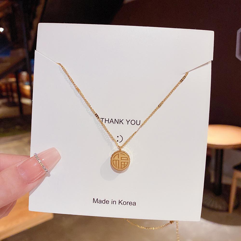 Minimalist Clavicle Necklace: Japanese & Korean Style, Luxurious Real Gold-Plated Titanium Steel Pendant for Women