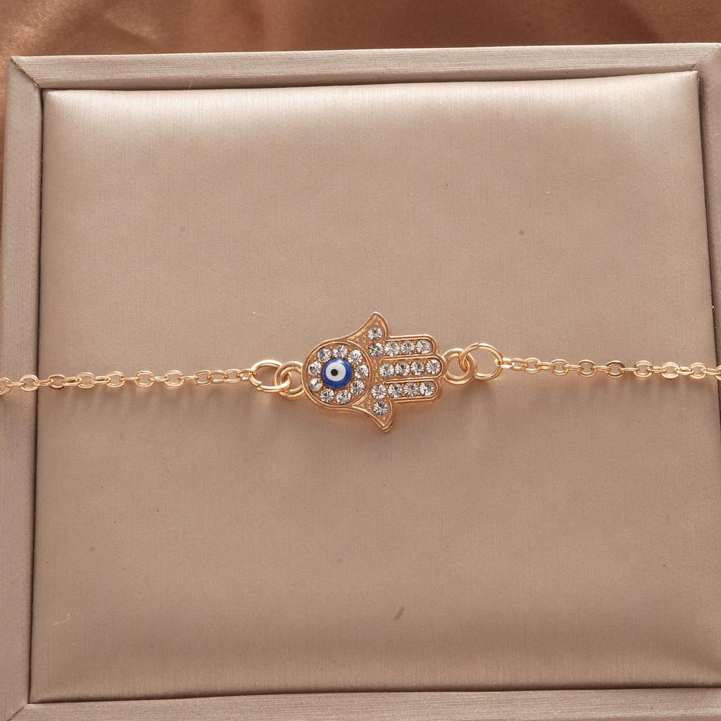 Ladies Titanium Steel Hand Shape Devil's Blue Pupil Crystal Bracelet Jewelry