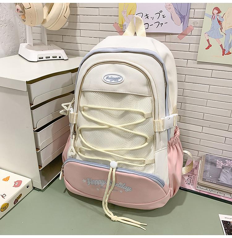 High-value cute primary school student spine care schoolbag female junior high school girl high school student backpack burden reduction