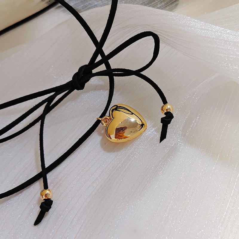 

Adjustable Wax Cord Choker Necklace with Heart Pendant